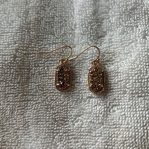 Kendra Scott earrings.